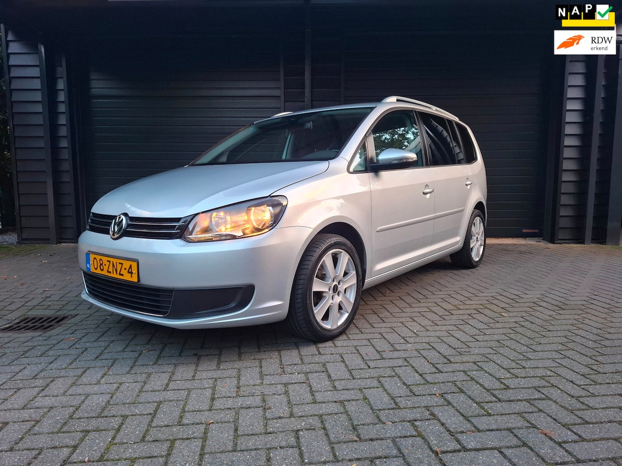 Volkswagen Touran - 1.2 TSI Comfortline 17" trekhaak cruise airco etc - AutoWereld.nl