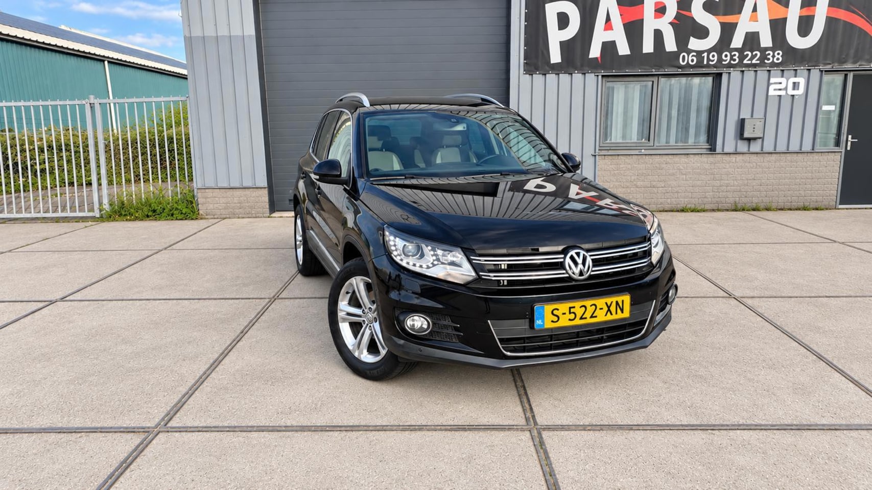 Volkswagen Tiguan - 1.4 TSI Sport&Style 4Motion - AutoWereld.nl