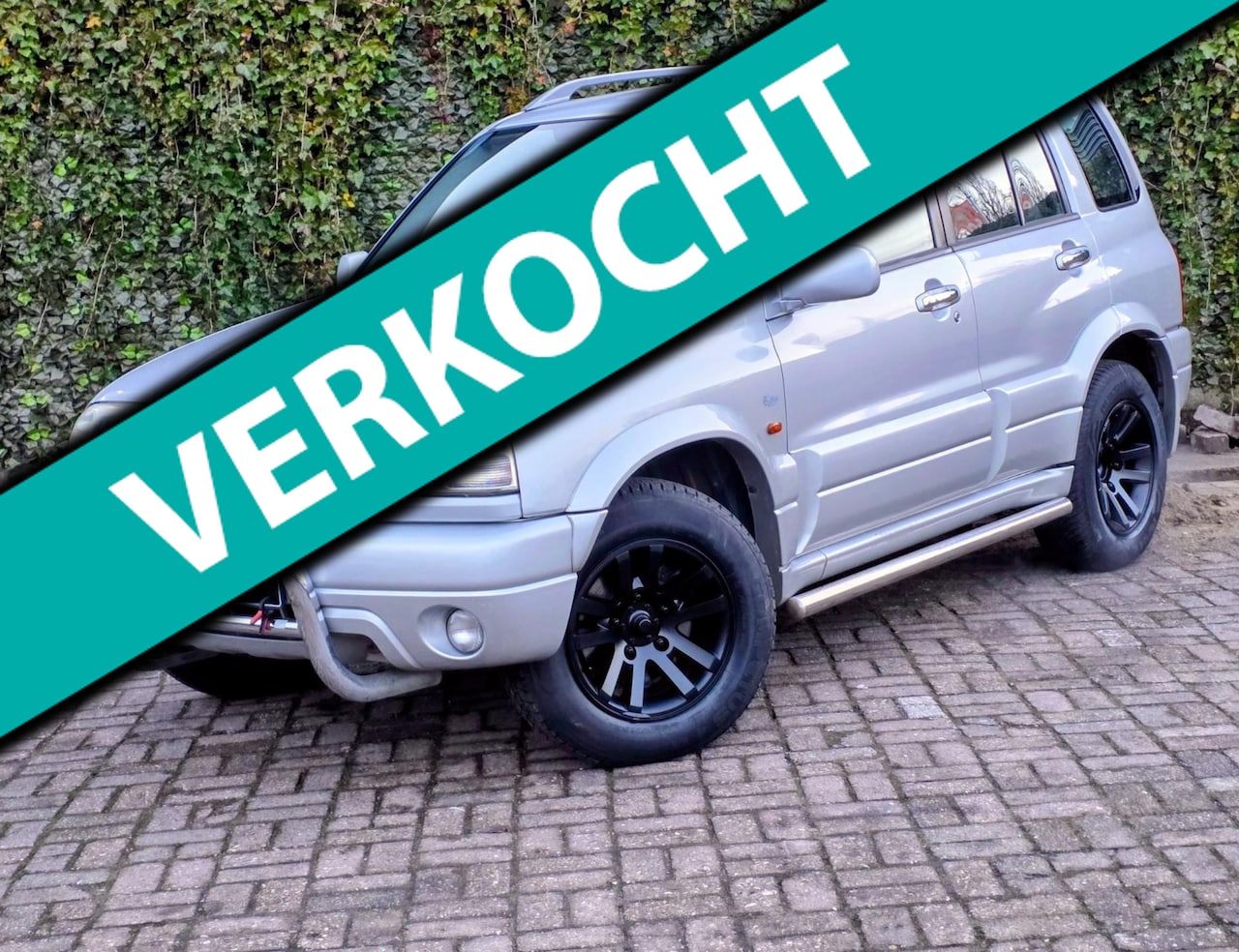 Suzuki Grand Vitara - 2.0 FreeStyle-3 Airco 4x4 APK Cruise Controle Trek Haak Leder - AutoWereld.nl
