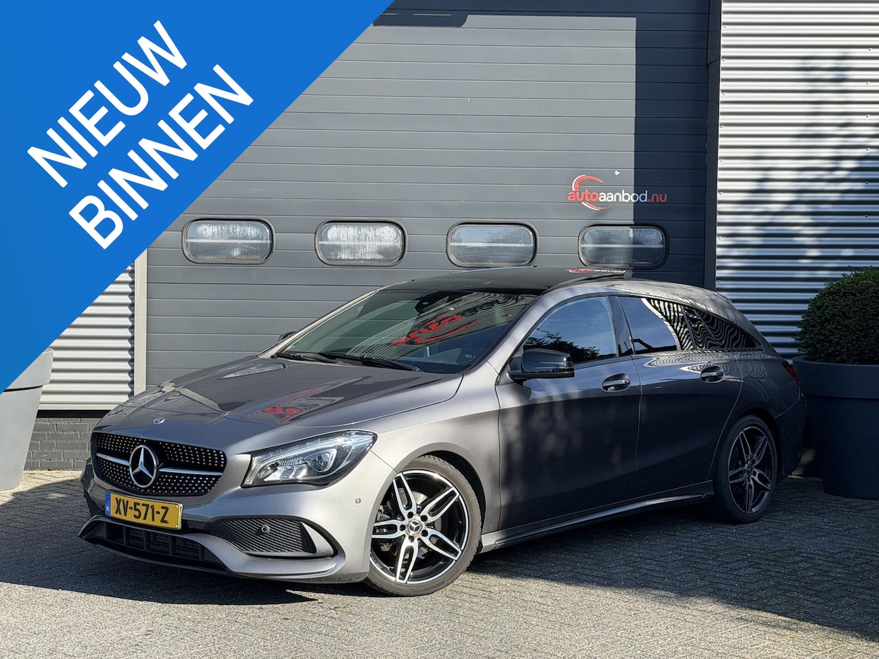 Mercedes-Benz CLA-klasse Shooting Brake - 180 AMG | Panoramadak | Camera | Navigatie | Carplay | Stoelverwarming | - AutoWereld.nl
