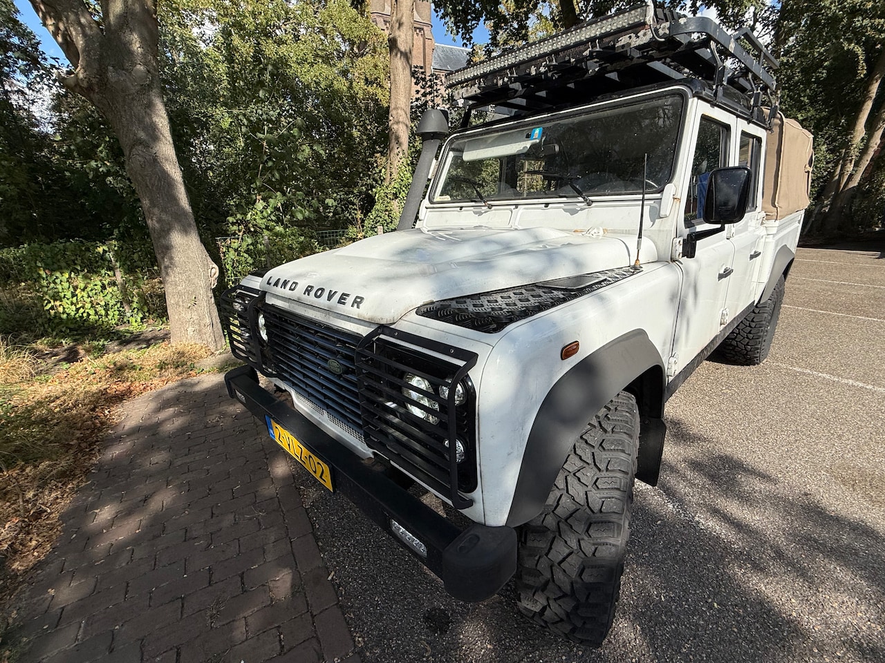 Land Rover Defender - 2.4 TD HT 110" E - AutoWereld.nl