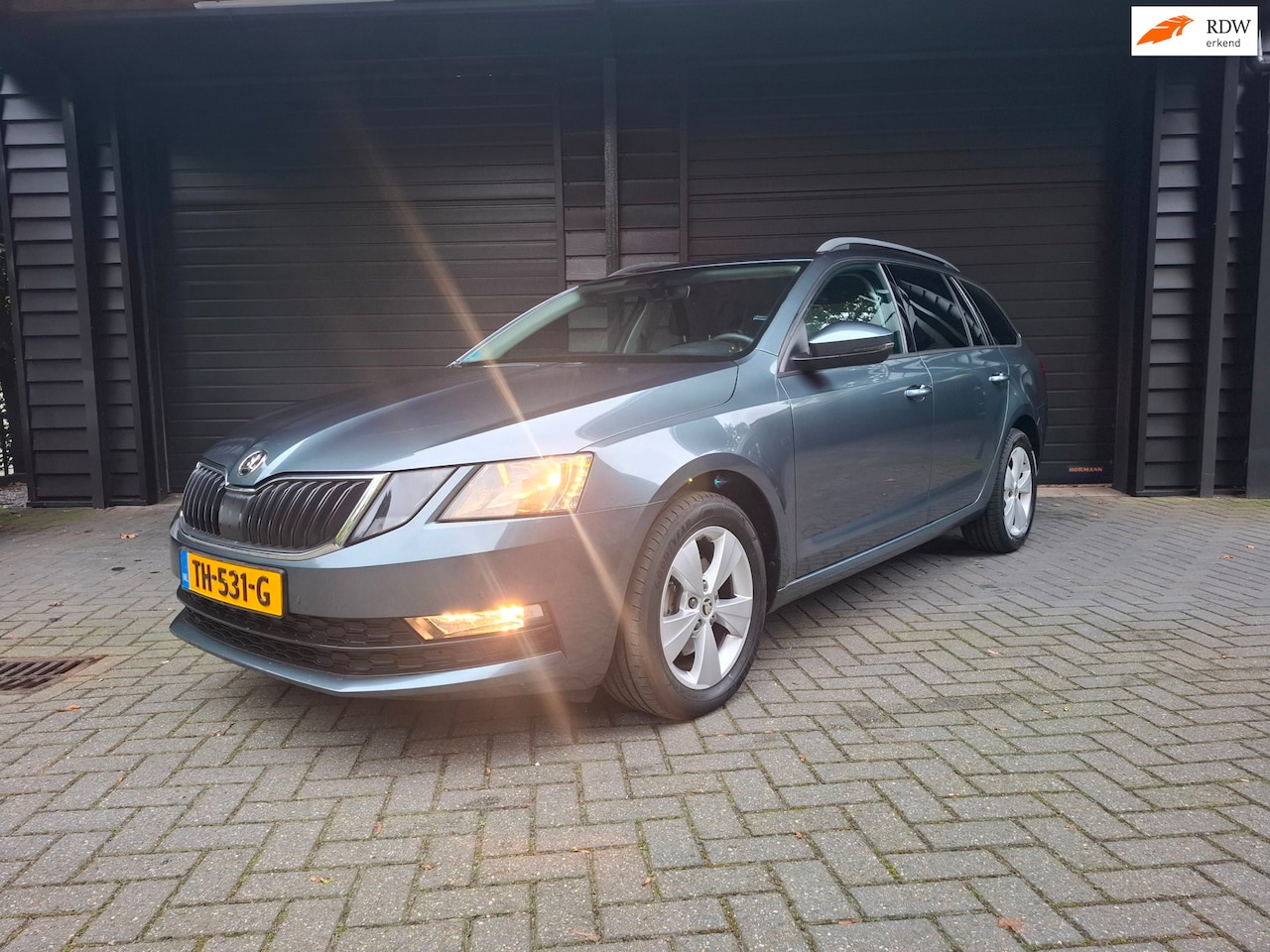 Skoda Octavia Combi - 1.0 TSI Business Carplay climat cruise etc - AutoWereld.nl