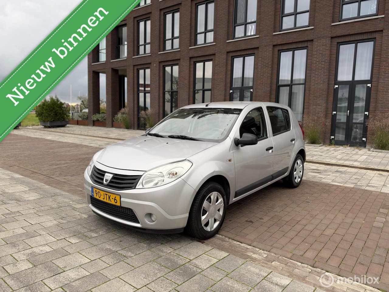 Dacia Sandero - 1.2 Lauréate Airco NAP ! - AutoWereld.nl