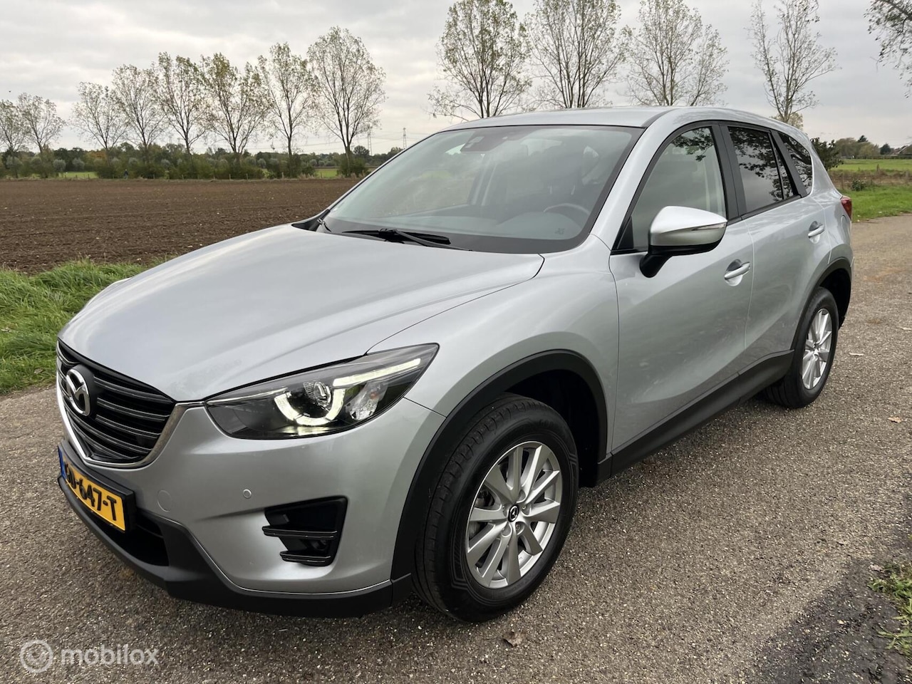 Mazda CX-5 - 2.0 SkyActiv-G 165 Skylease 2WD 2.0 SkyActiv-G 165 Skylease+ 2WD/Navi/Trekhaak - AutoWereld.nl