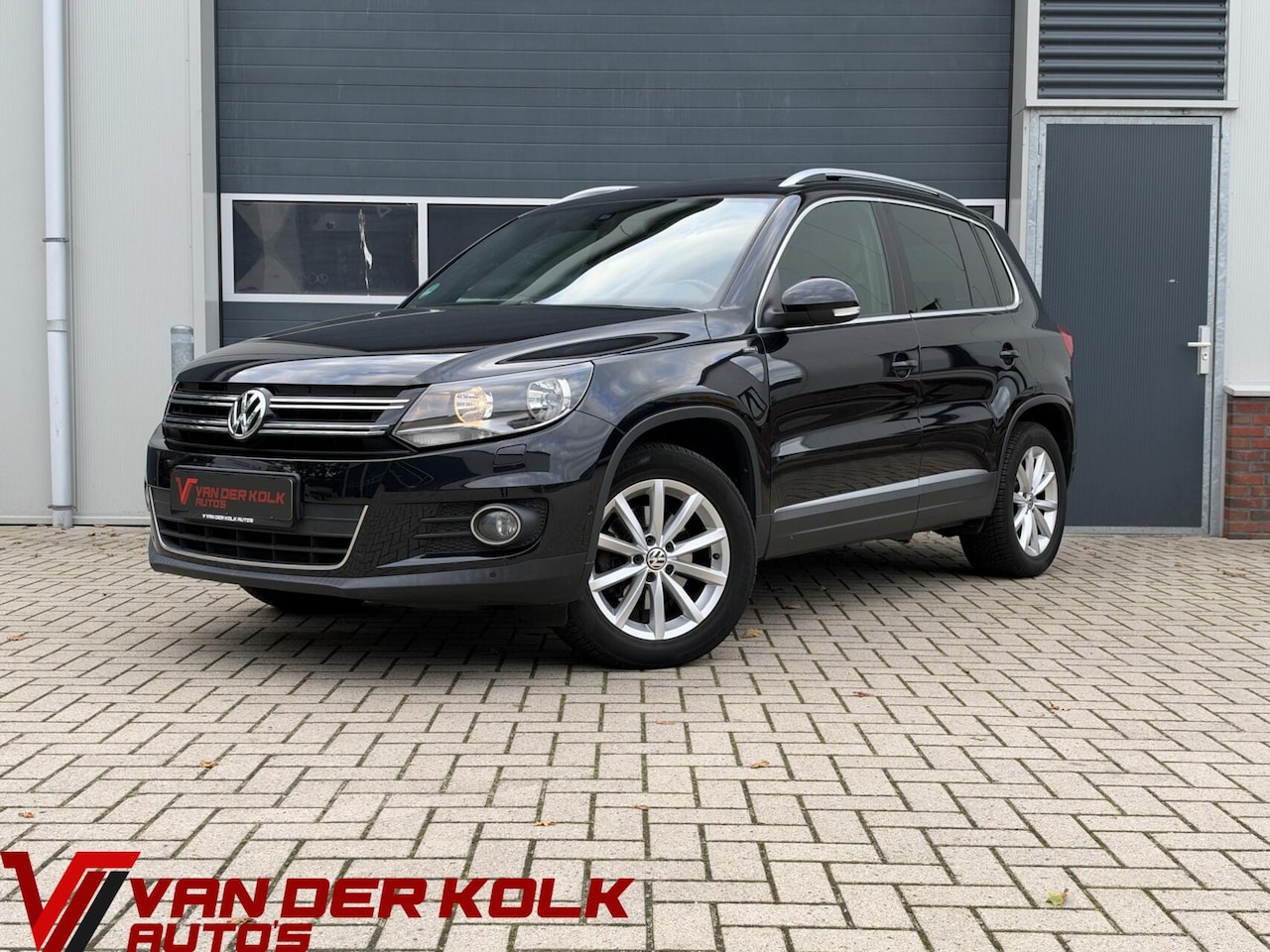 Volkswagen Tiguan - 1.4 TSI Sport&Style | Panorama | Camera | Navigatie | Climate | Stoelverwarming | Cruise - AutoWereld.nl