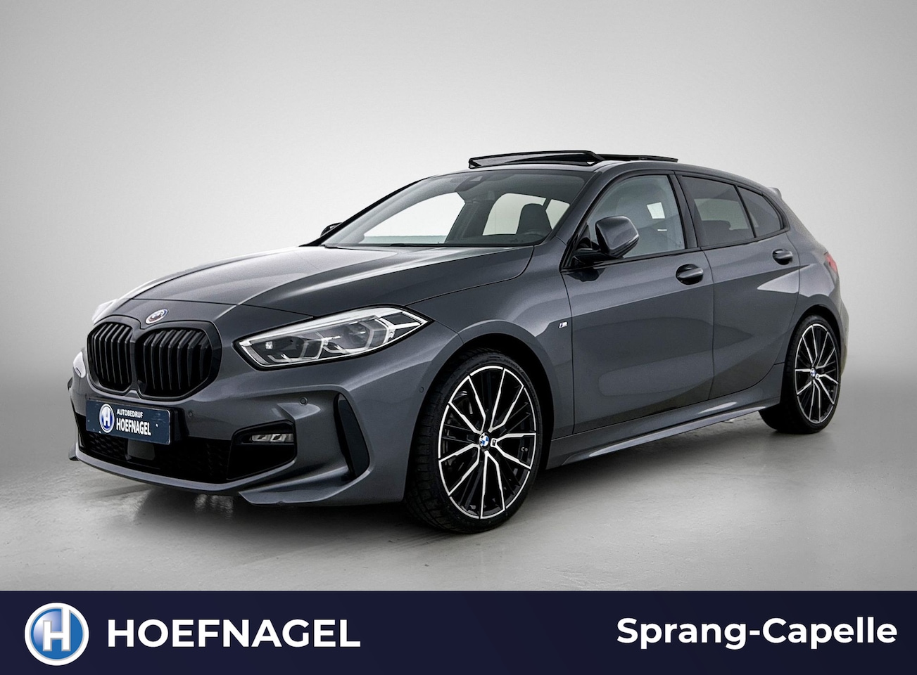 BMW 1-serie - 118i High Executive M Sport | Schuifdak | Kuipstoelen | Camera | Stoelverwarming | CarPlay - AutoWereld.nl