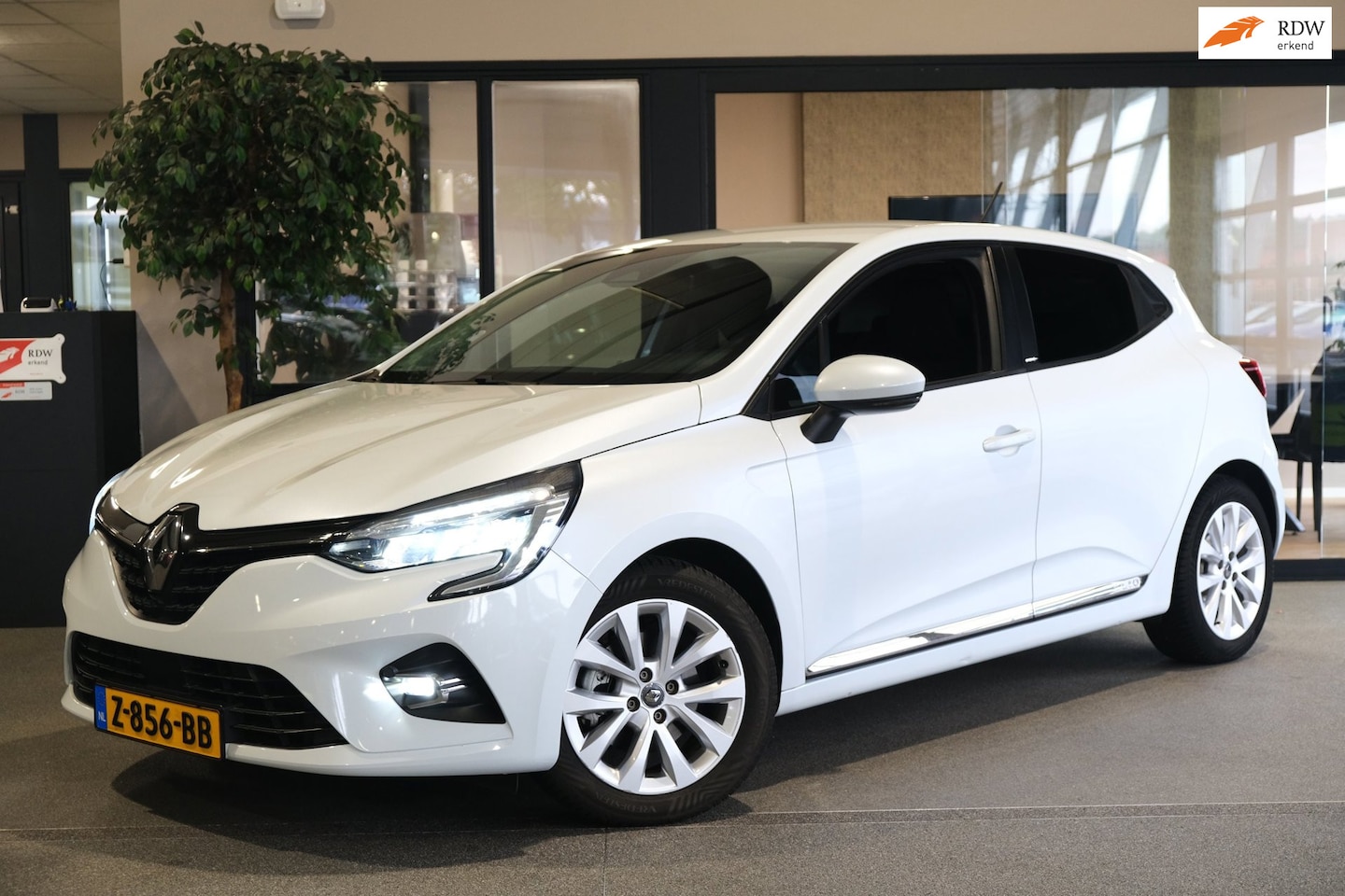 Renault Clio - 1.6 E-Tech Hybrid 140 Zen Navi Cruise PDC - AutoWereld.nl