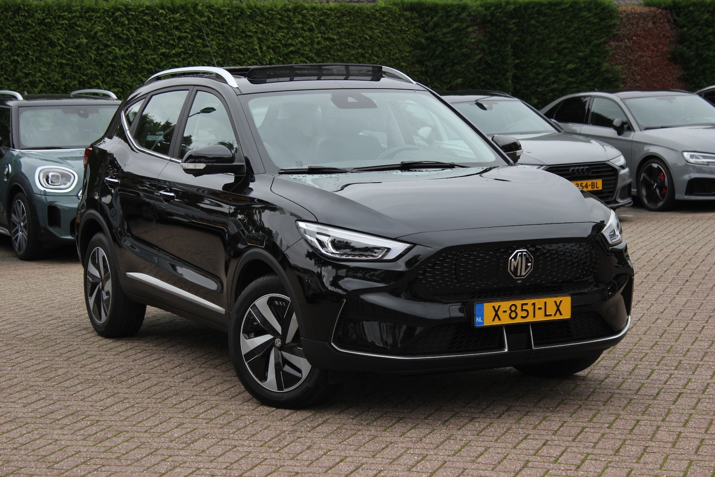 MG MG ZS EV - Long Range Luxury 70 kWh / SOH 95.9 % / Panoramadak / Camera / Leder / CarPlay / Keyless / - AutoWereld.nl