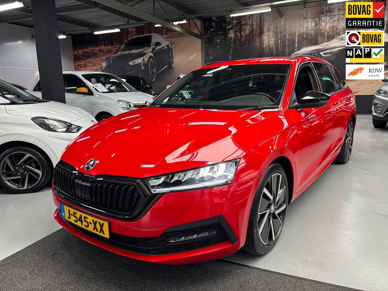 Skoda Octavia Combi - 1.0 TSI Sport Business / Navigatie - AutoWereld.nl