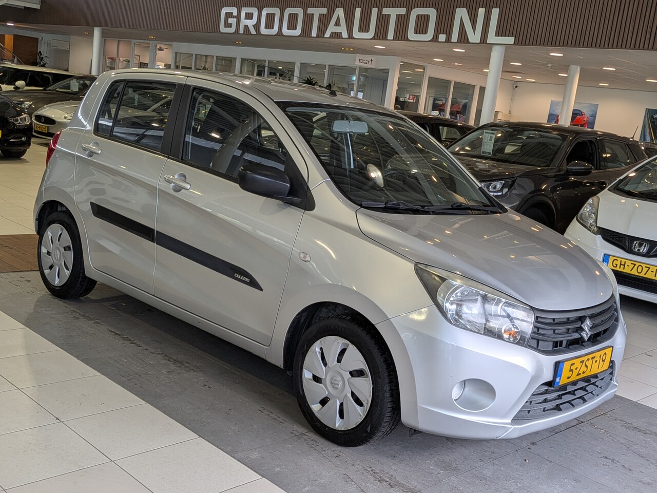 Suzuki Celerio - 1.0 Comfort Start/Stop Systeem, Airco, Stuurbekrachtiging - AutoWereld.nl