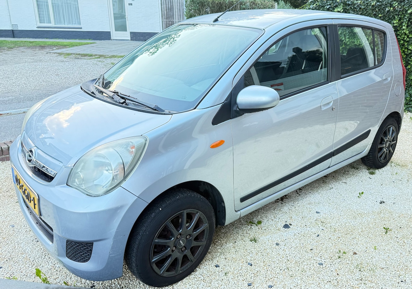 Daihatsu Cuore - 1.0 Premium - AutoWereld.nl