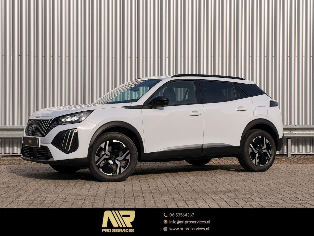 Peugeot 2008 - 1.2 Hybrid 145 Style NAVI | AUTOMAAT | NIEUWSTAAT!! - AutoWereld.nl