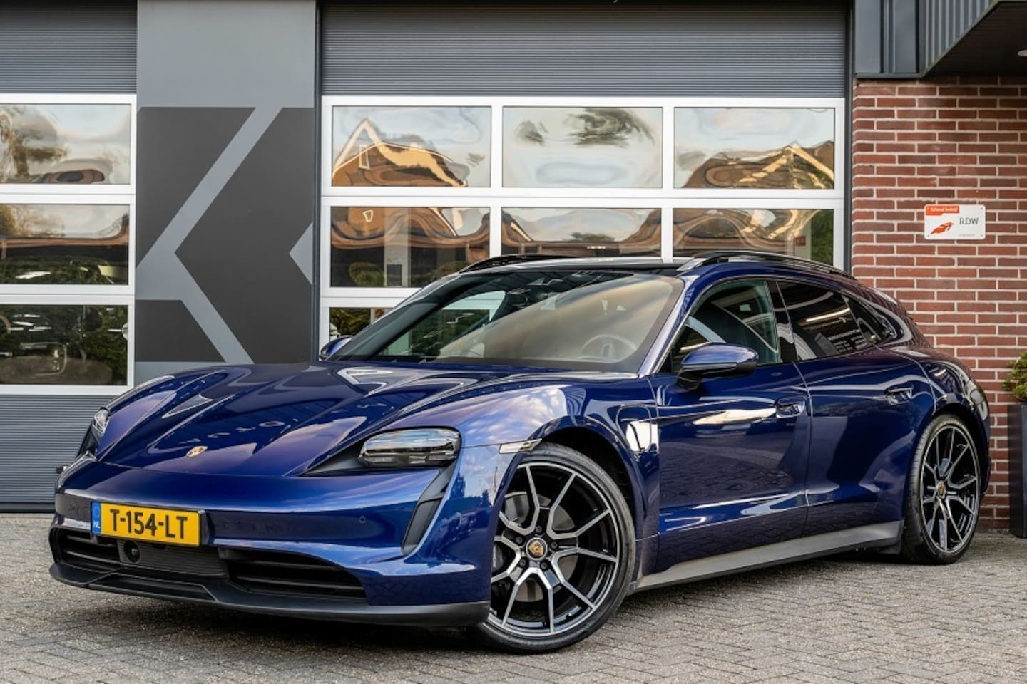 Porsche Taycan Sport Turismo - | Performance Accu Plus | Comfort Seats | Memory | BOSE | Panoramadak | Sport Chrono | Cam - AutoWereld.nl