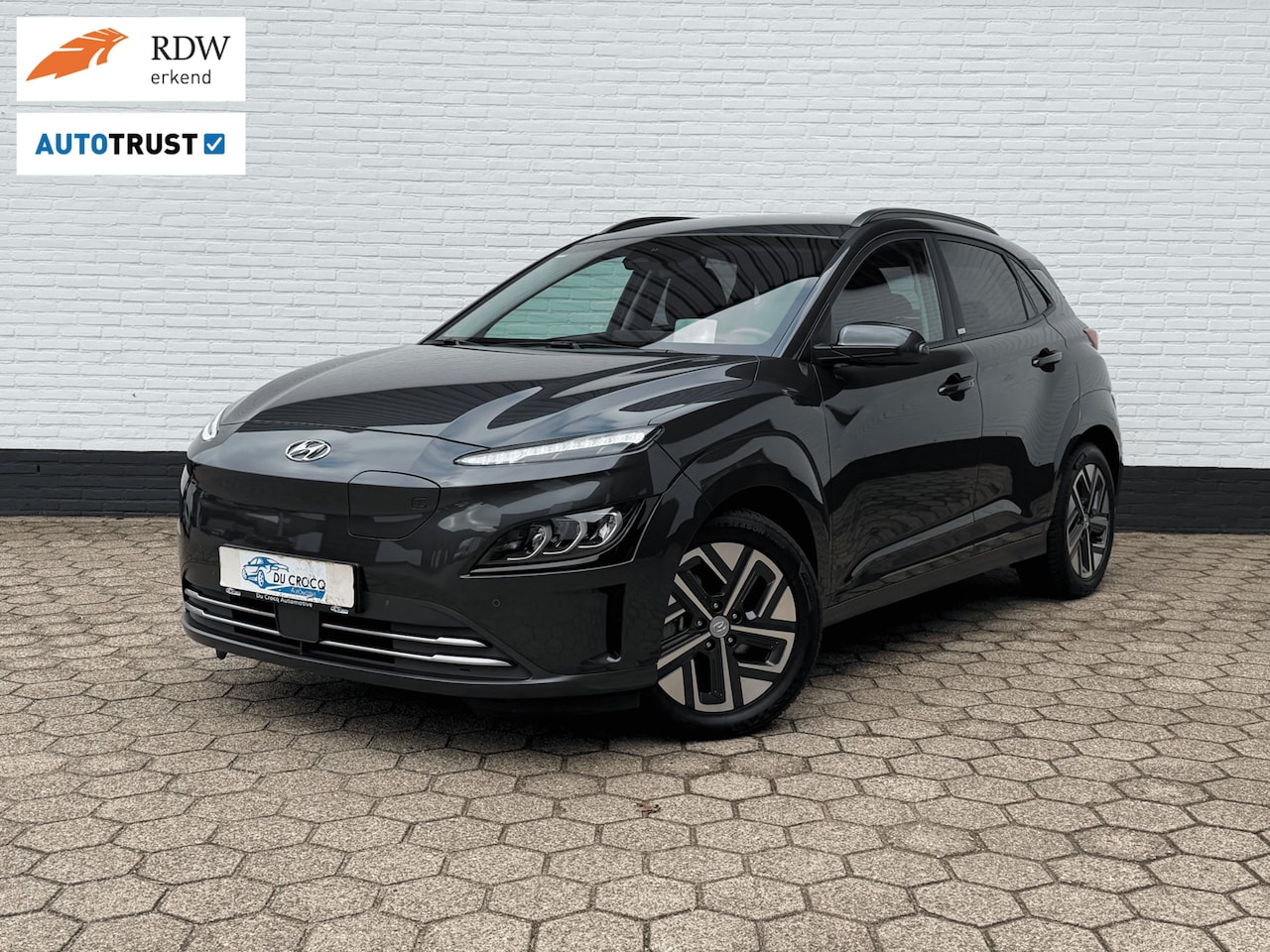 Hyundai Kona Electric - EV Premium 64kWh ACC l WARMTEPOMP l TREKHAAK l SOH 100% - AutoWereld.nl