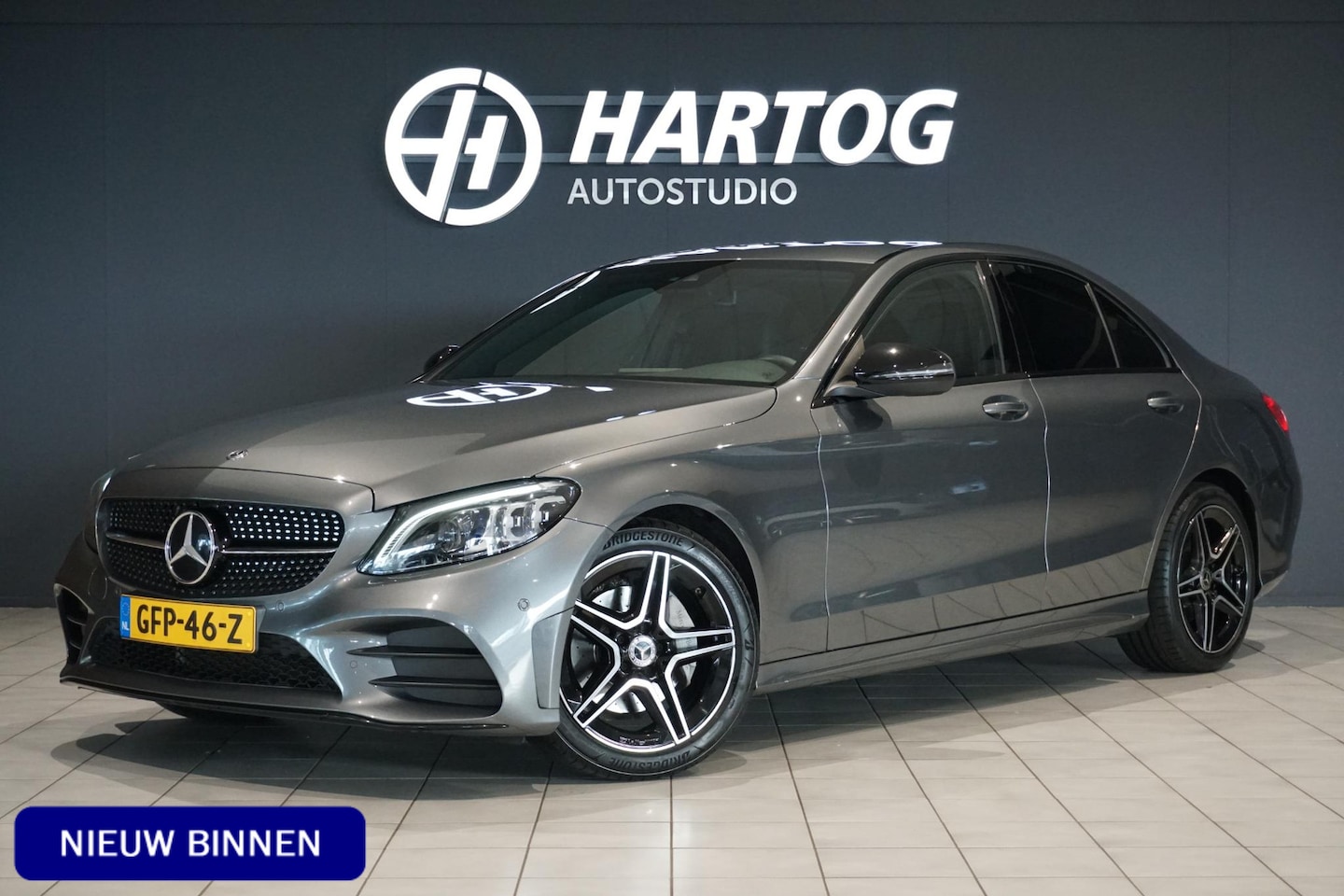 Mercedes-Benz C-klasse - 180 Business Solution AMG + CAMERA / LEDER / MULTIBEAM LED / DODEHOEK - AutoWereld.nl