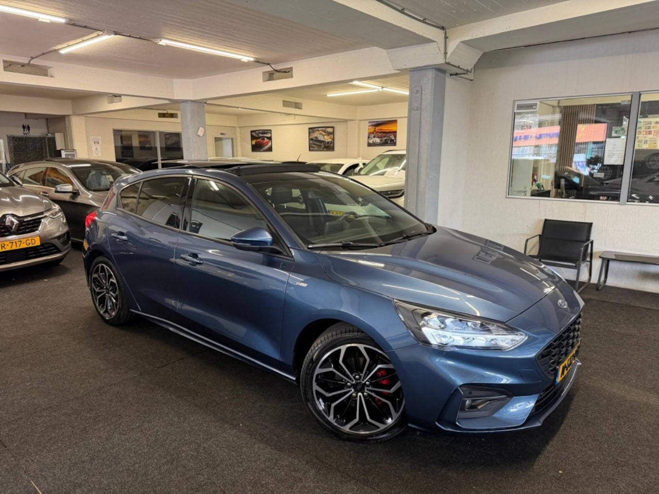 Ford Focus - 1.0 EcoB. Hybrid ST-Line X Business*Schuifdak*Carplay - AutoWereld.nl