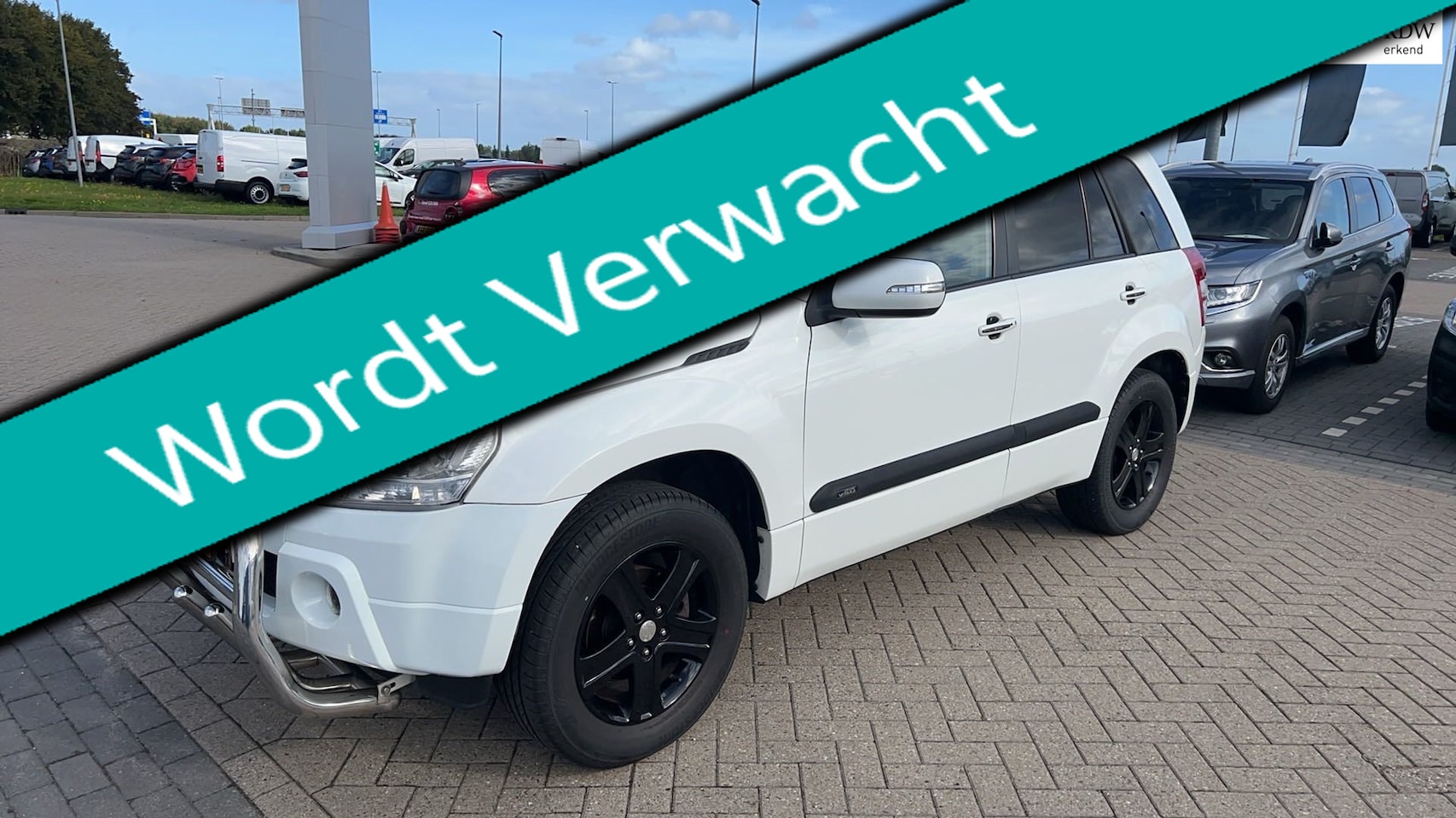 Suzuki Grand Vitara - 2.4 High Exe 4WD 170pk Automaat Clima Navi Trekhaak - AutoWereld.nl