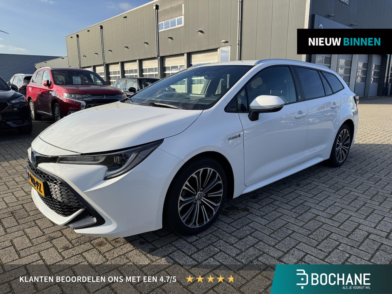 Toyota Corolla Touring Sports - 1.8 Hybrid Business Plus | Apple Carplay/Androit Auto | Camera | Navigatie | Stuur- en voo - AutoWereld.nl