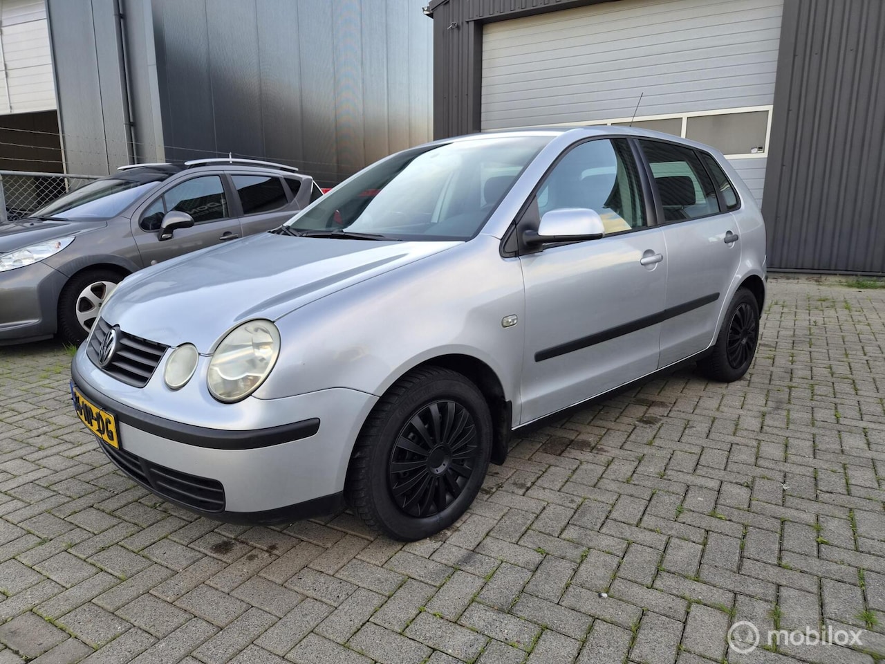 Volkswagen Polo - 1.4-16V Comfortline AIRCO/CRUICE/NAVI APK 10/2027 - AutoWereld.nl