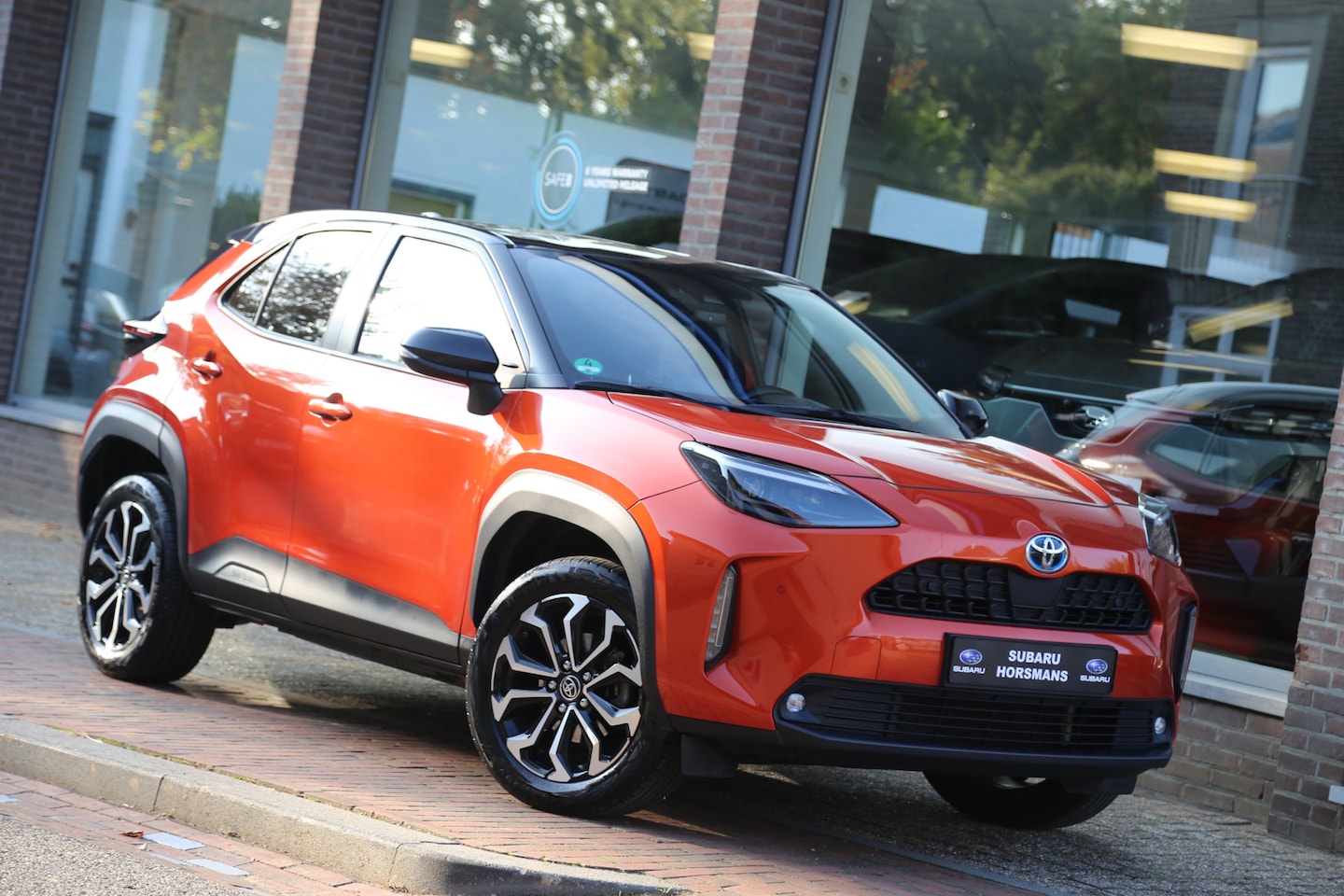 Toyota Yaris Cross - 1.5 Hybrid Dynamic Bi-Tone Navi Camera ACC - AutoWereld.nl