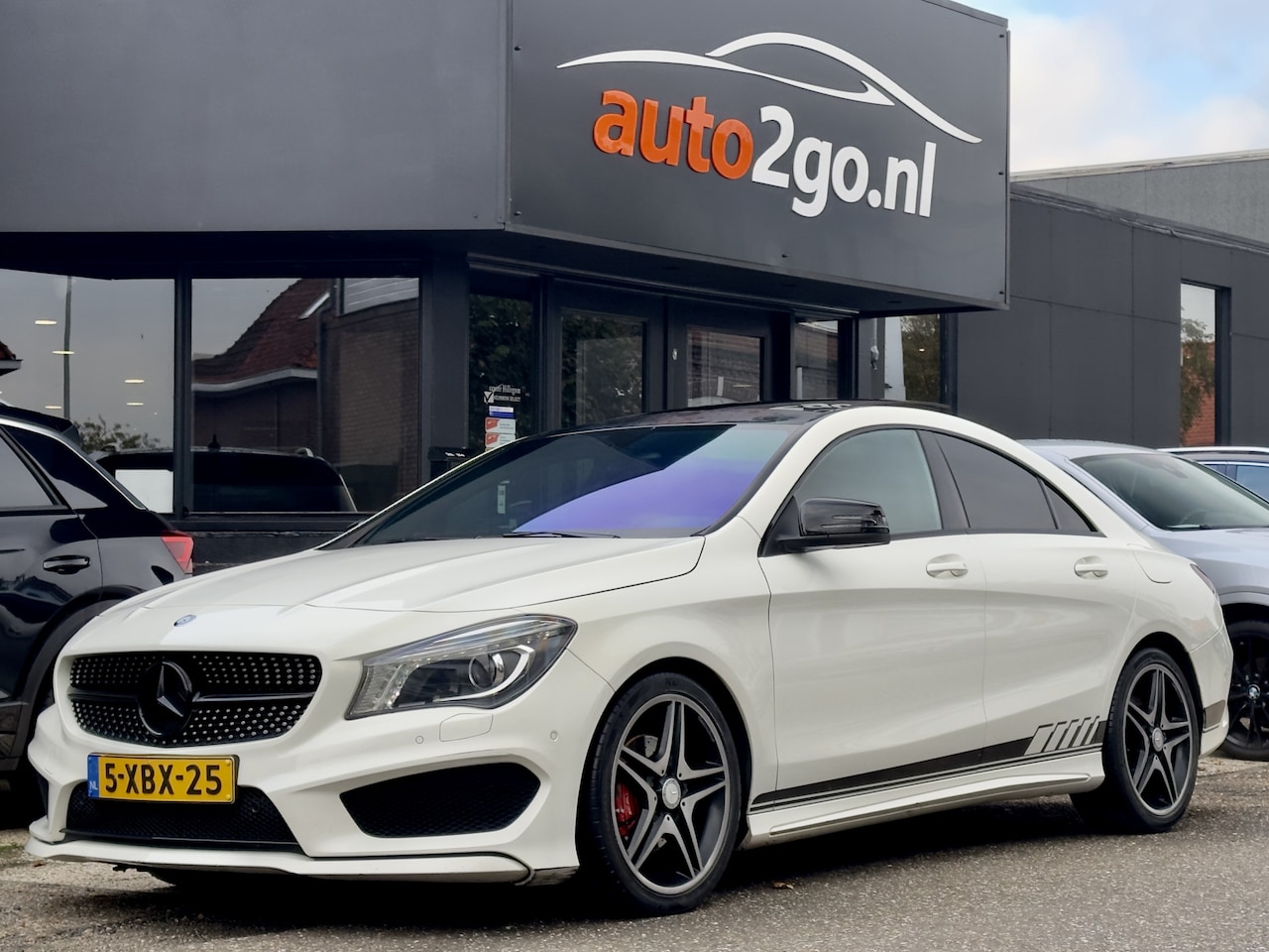 Mercedes-Benz CLA-Klasse - 180 AMG-STYLING PANODAK LEDER NAVI AIRCO LED LMV PDC - AutoWereld.nl
