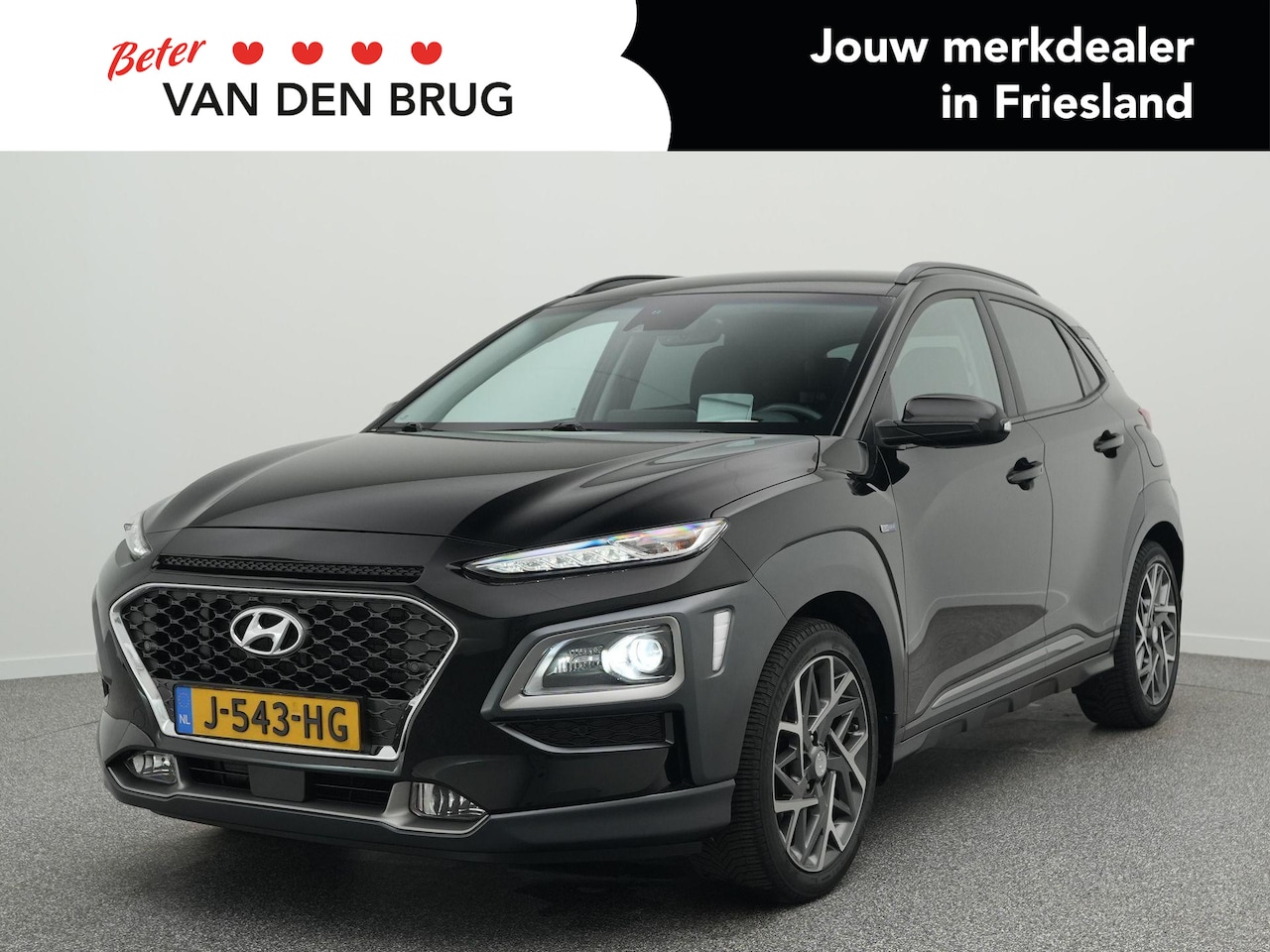 Hyundai Kona - 1.6 GDI HEV Premium 142 PK Automaat | Head-Up Display | Achteruitrijcamera | Stuur & Stoel - AutoWereld.nl