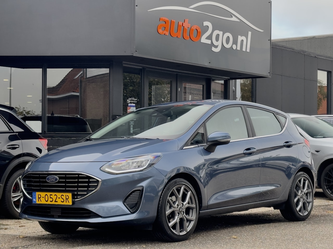Ford Fiesta - 1.0 ECOBOOST HYBRID ST-LINE SPORT-INT APPLE-CARPLAY AIRCO DAB LED LMV PDC - AutoWereld.nl
