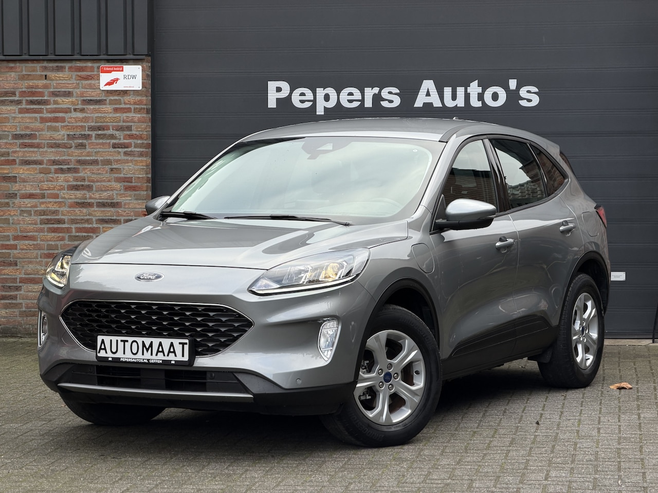 Ford Kuga - 2.5 PHEV Cool & Connect Stoelverwarming | Navi | PDC | Cruise | Carplay | Half leder Plug - AutoWereld.nl
