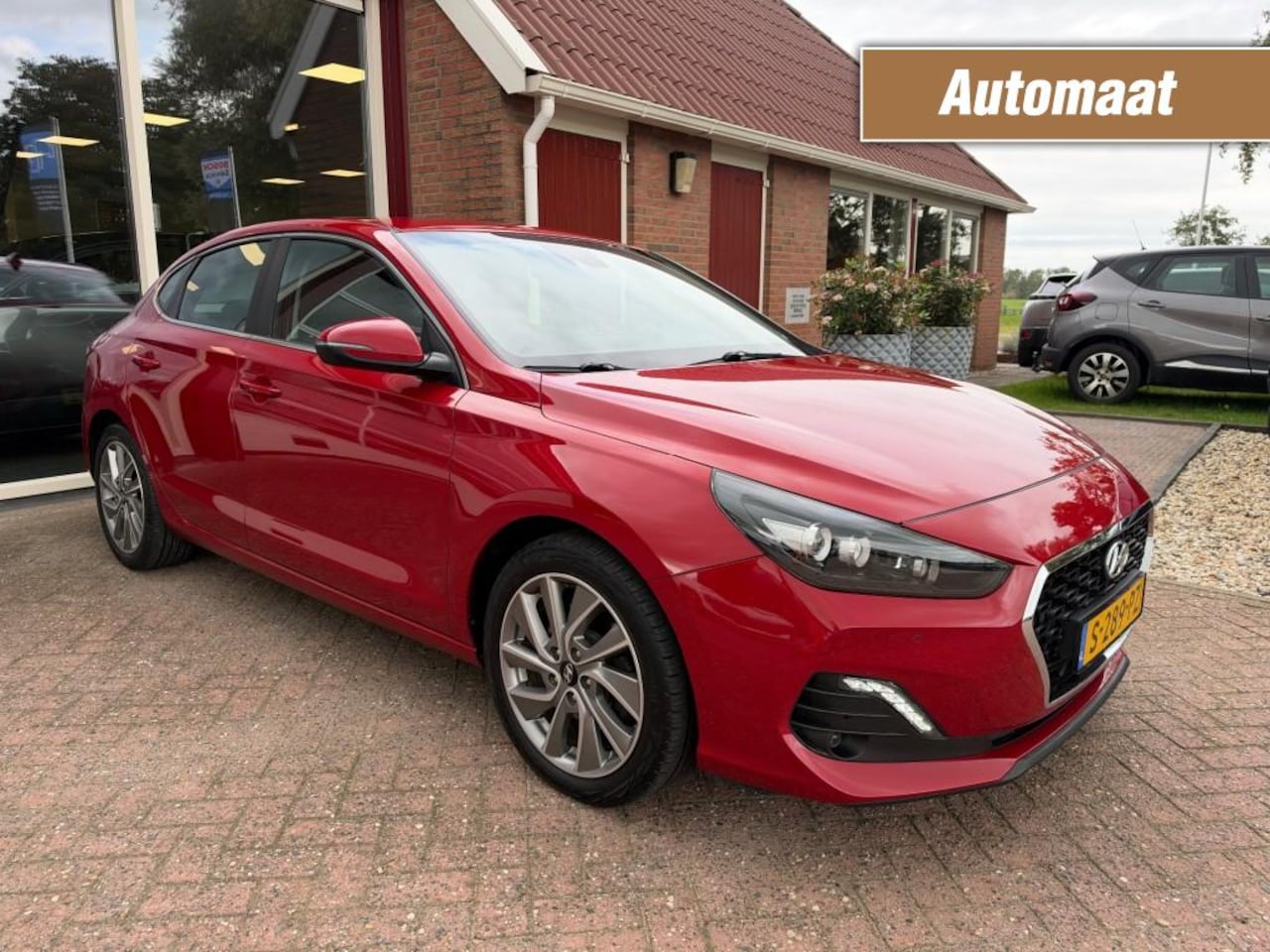 Hyundai i30 - 1.4 T-GDI COMFORT Camera/Stuur- en stoelvewarming/Climate Control/Cruise Conrol - AutoWereld.nl