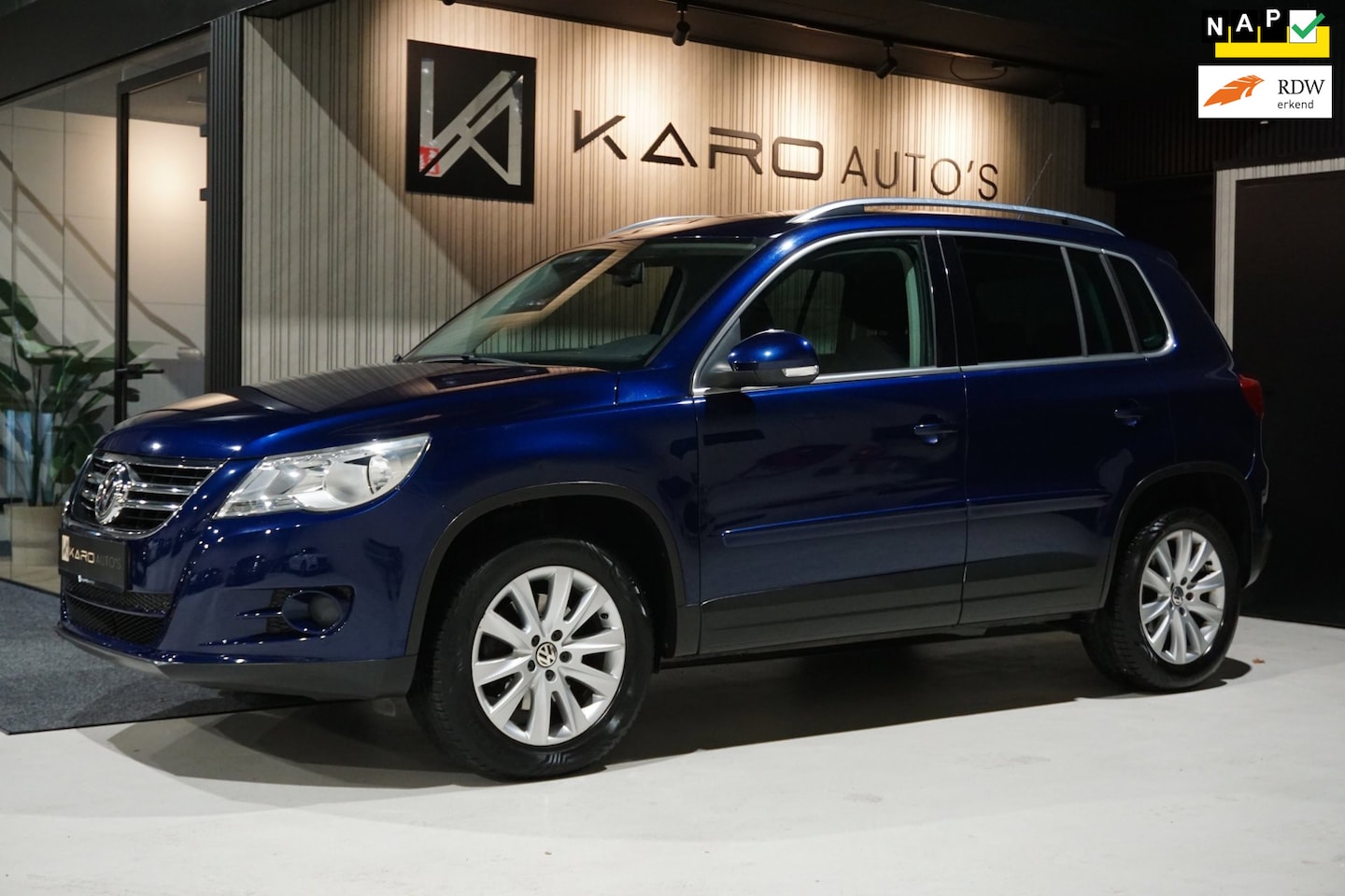 Volkswagen Tiguan - 1.4 TSI Sport&Style 4Motion Nav Cruis Clim - AutoWereld.nl