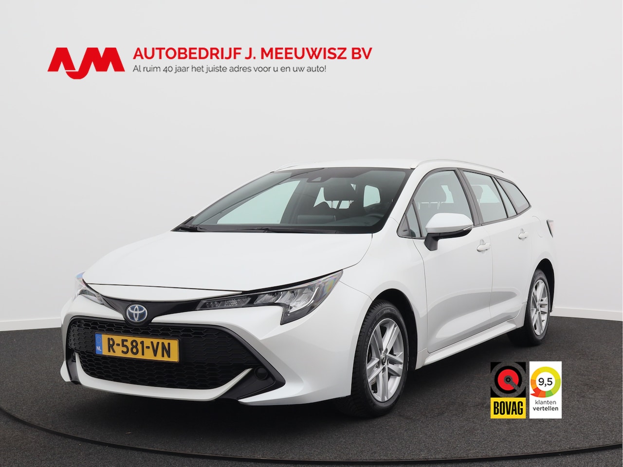 Toyota Corolla Touring Sports - 1.8 Hybrid Active/ lage km/ wit metallic! zeer mooi! - AutoWereld.nl