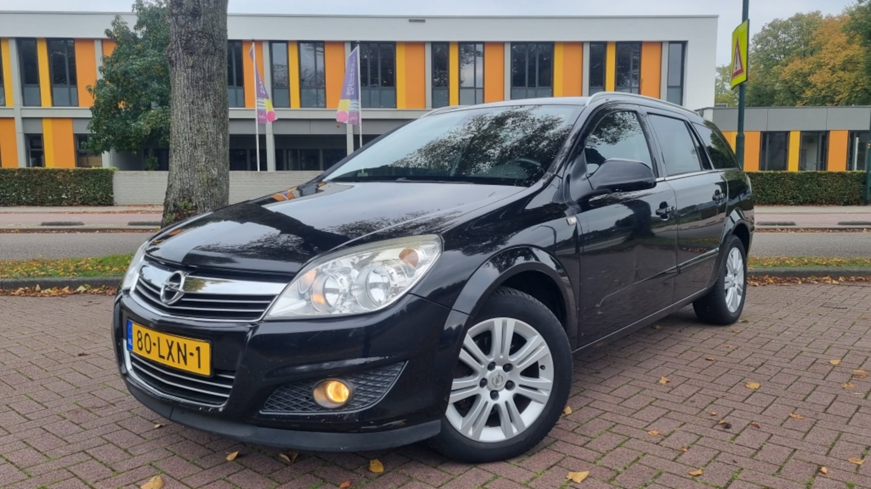 Opel Astra - 1.6 16V Station Cosmo Leer/ Navi/ Trekhaak - AutoWereld.nl