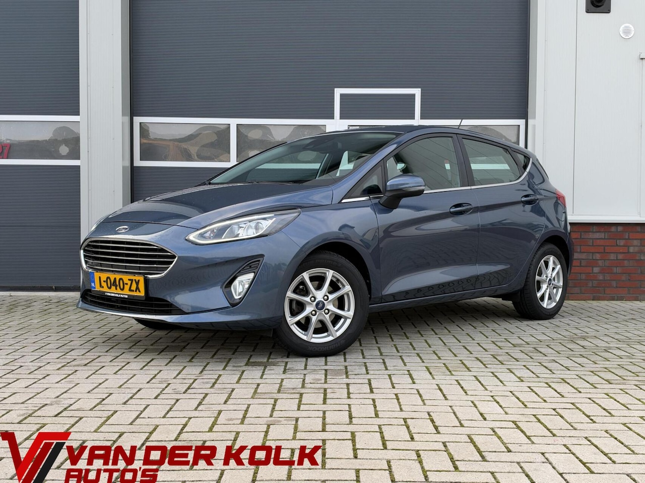 Ford Fiesta - 1.0 EcoBoost Titanium | LED | CarPlay | Navigatie | Cruise | Climate | Lichtmetaal | Senso - AutoWereld.nl