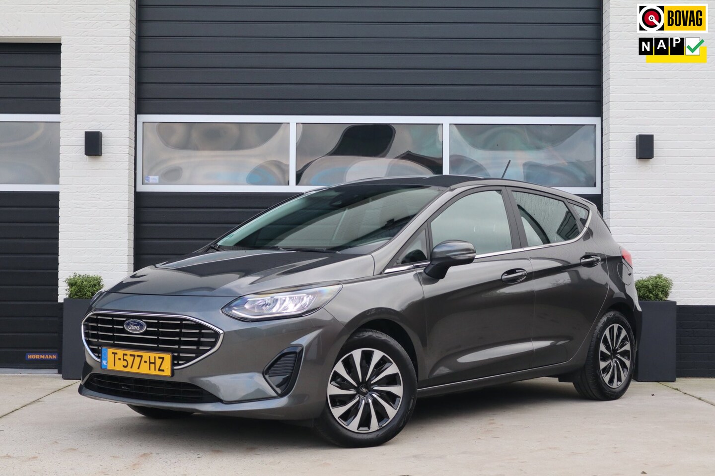 Ford Fiesta - 1.0 EcoBoost 125pk Hybrid Titanium - Trekhaak - Carplay - LED - PDC - Climate & Cruise con - AutoWereld.nl