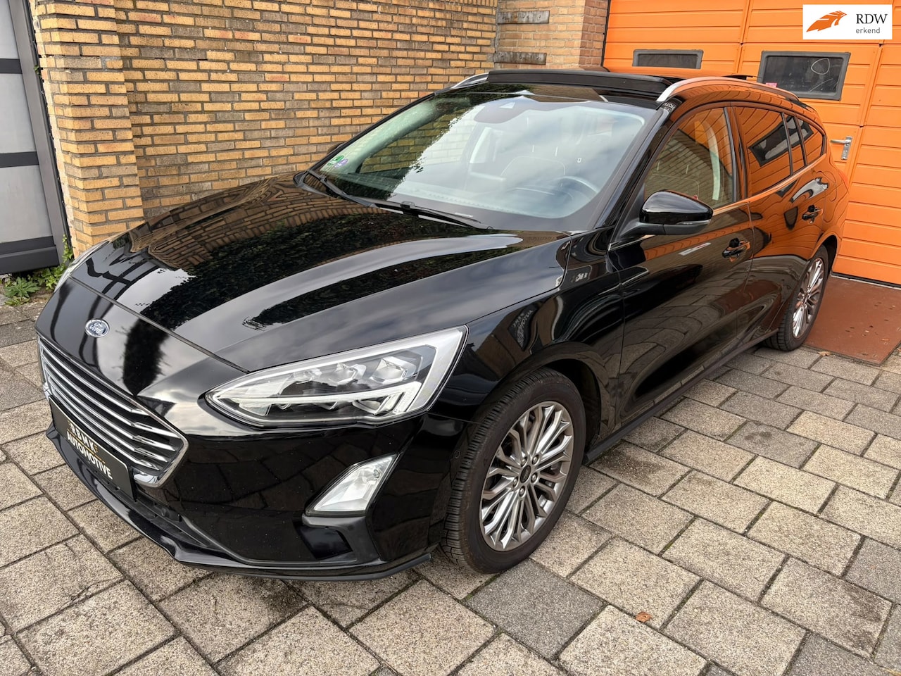 Ford Focus Wagon - 1.5 EcoBoost Titanium Business / Panorama dak! - AutoWereld.nl