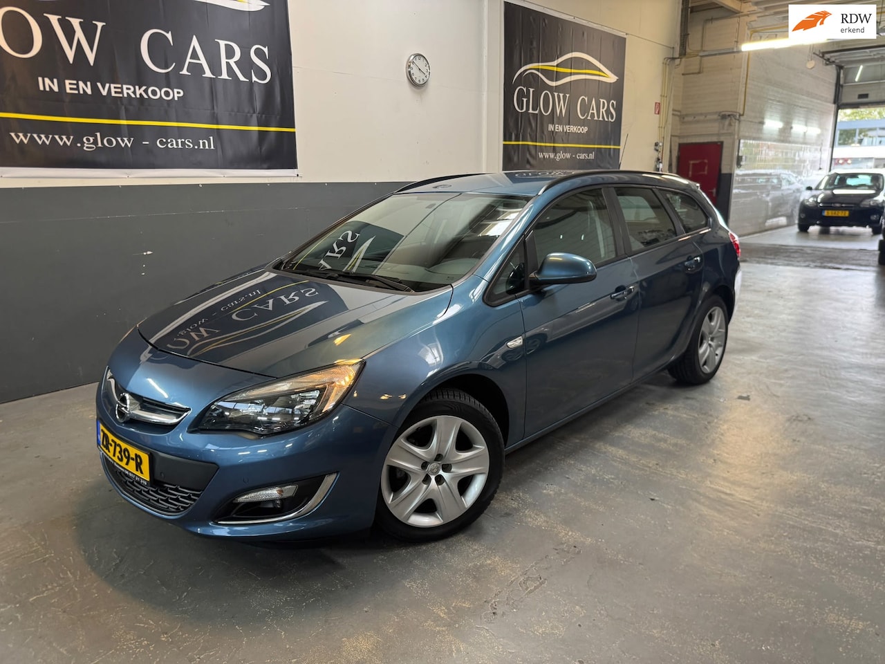 Opel Astra Sports Tourer - 1.4 Turbo Design Edition |AIRCO|PDC|TREKHAAK|APK - AutoWereld.nl