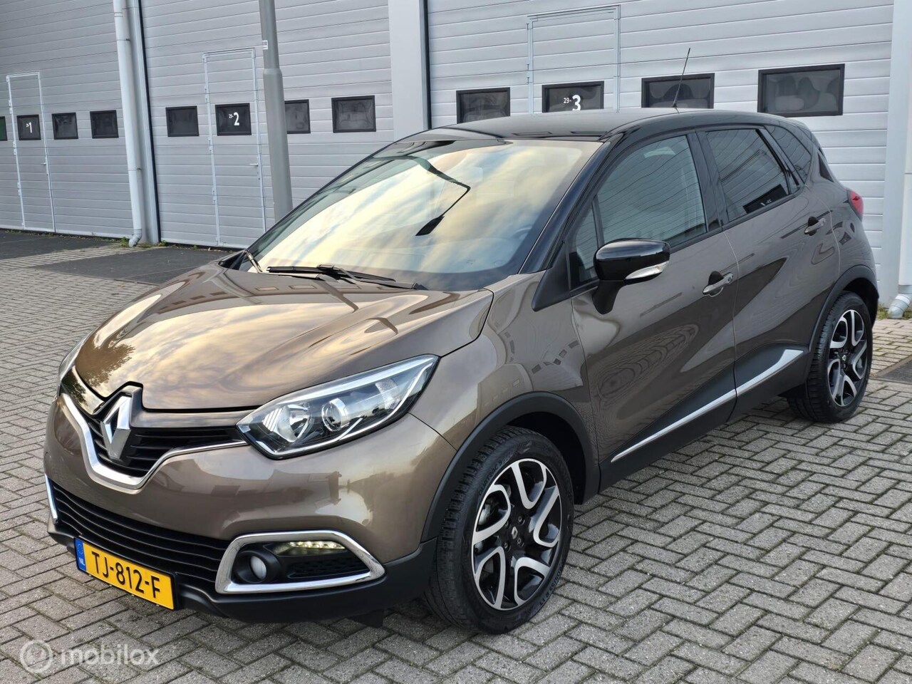Renault Captur - 1.2 TCe Helly Hansen | Automaat | Trekhaak - AutoWereld.nl
