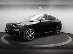 BMW X6 - M50i High Executive Orig. NL / 360 Camera / Leder dash. / Achteras best. / Merino / 21'' L