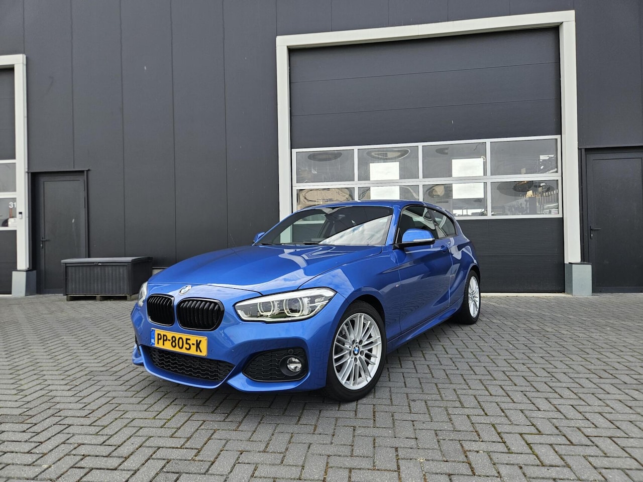 BMW 1-serie - 118i M-Pakket Estorilblau | Stage1 | M140i | PDC - AutoWereld.nl
