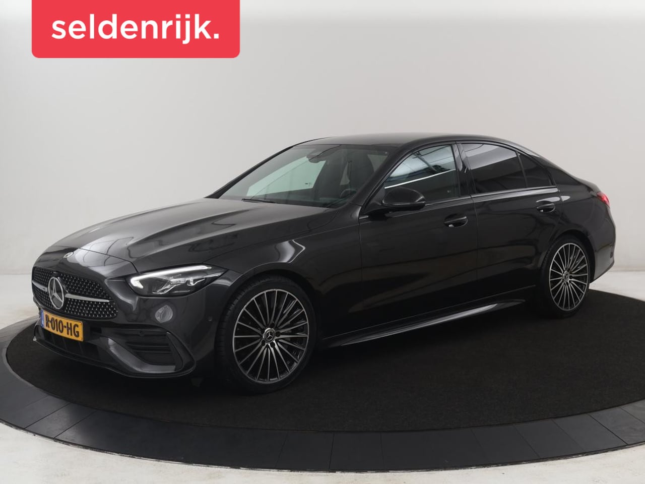 Mercedes-Benz C-klasse - 200 Launch Edition AMG Line | Leder | Cruise control | Stoelverwarming | Camera | Park ass - AutoWereld.nl
