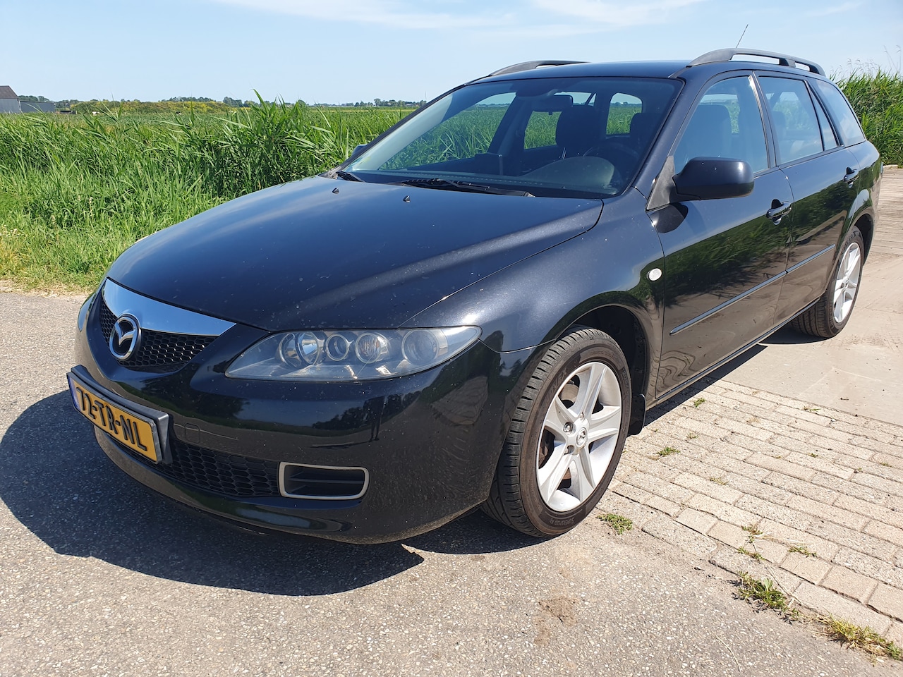 Mazda 6 Sportbreak - 1.8i Touring apk 09-2026 - AutoWereld.nl