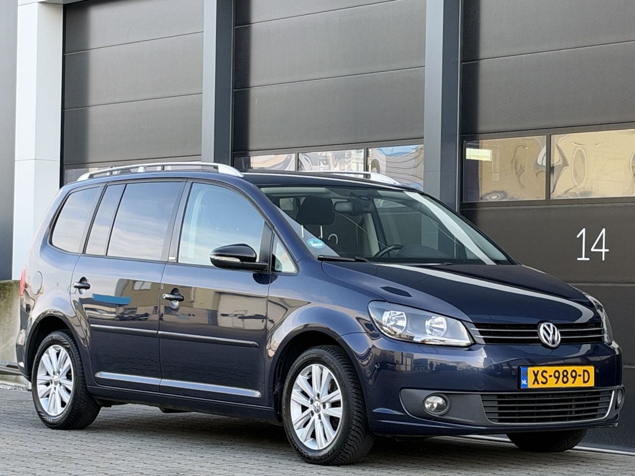 Volkswagen Touran - 1.2 TSI Style 7-PERS - AutoWereld.nl