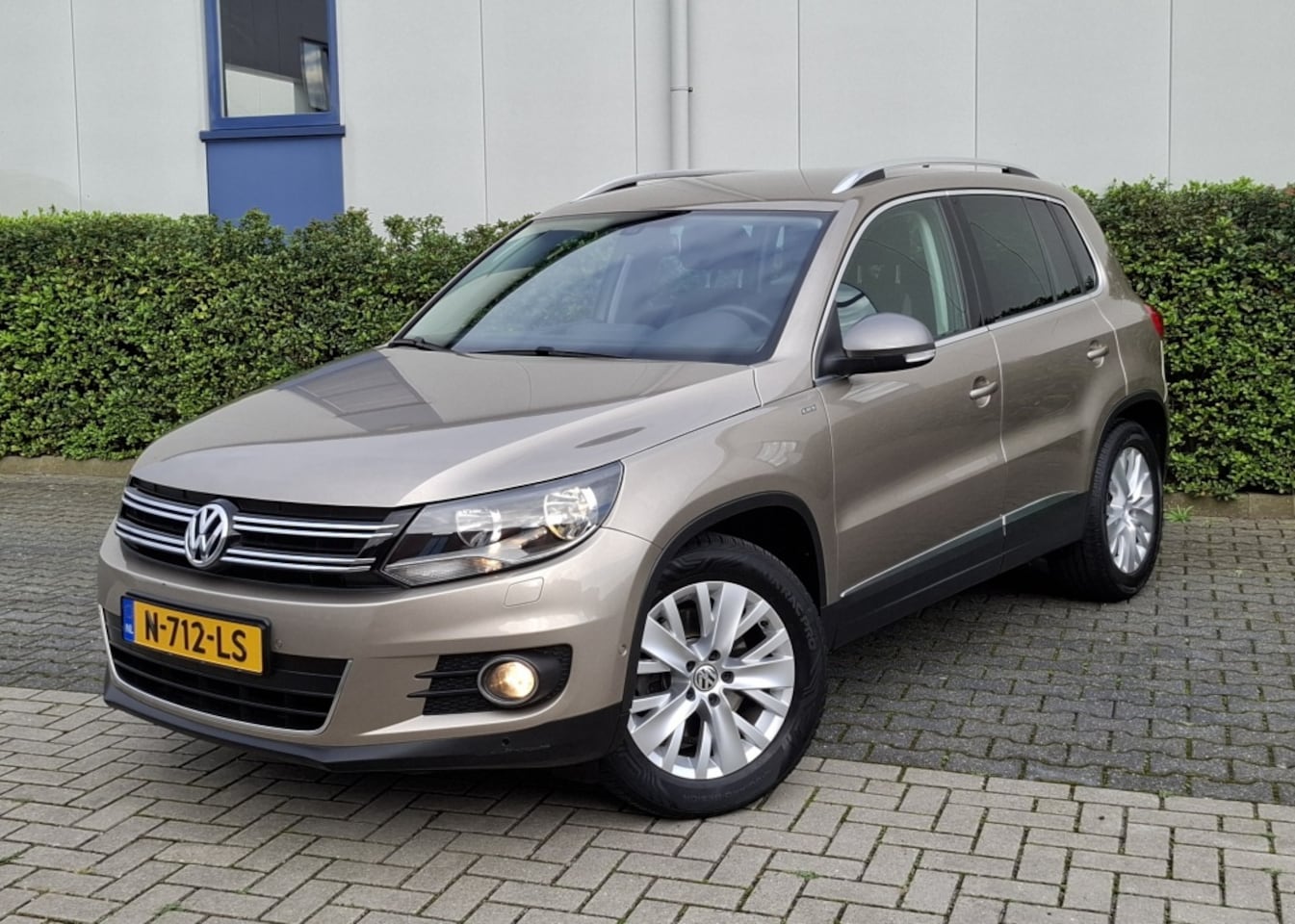 Volkswagen Tiguan - 1.4 TSI 160pk BMT DSG Sport & Style - AutoWereld.nl