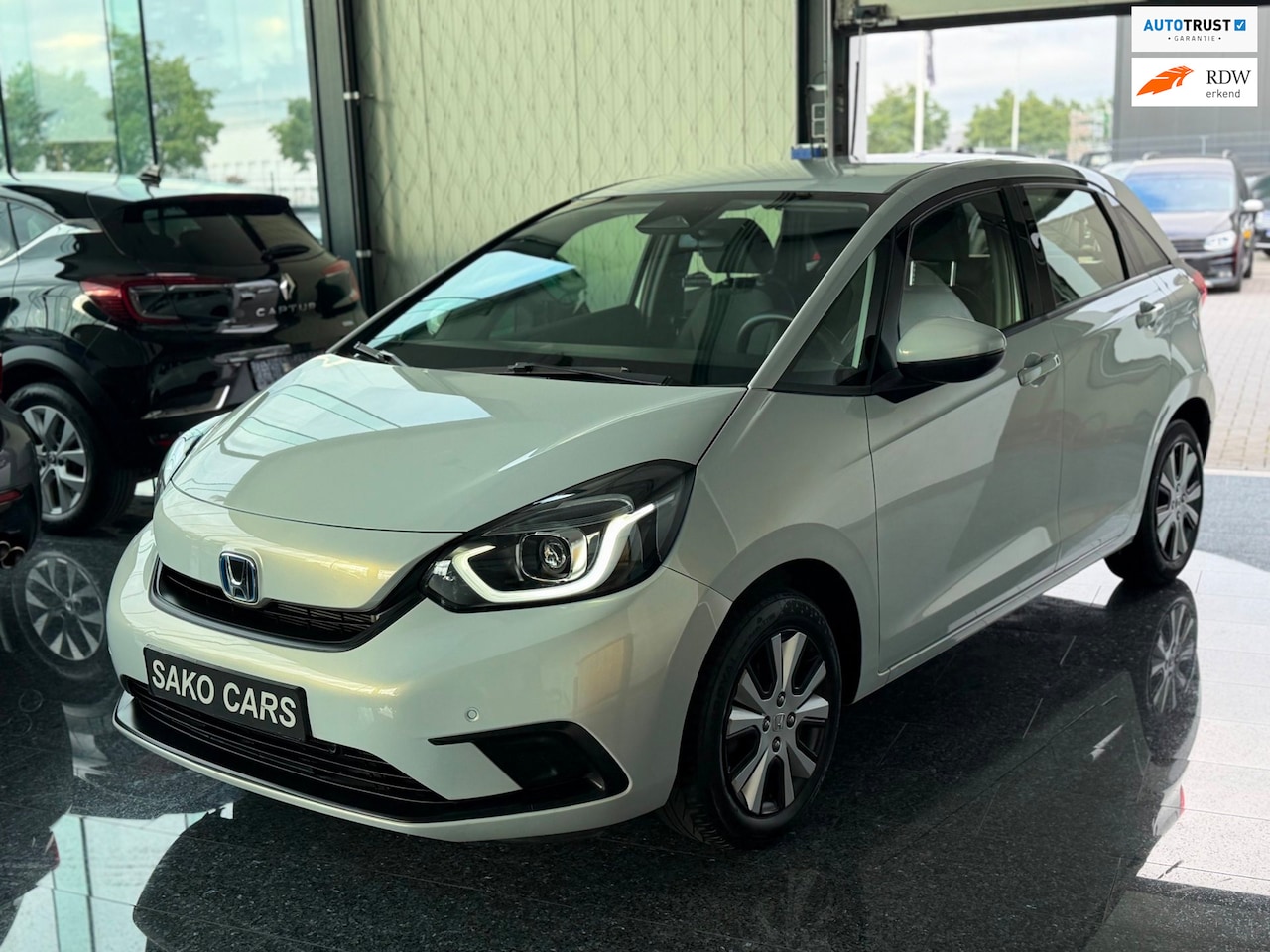 Honda Jazz - 1.5 e:HEV Elegance Hybride 2022 Zeer zuinig! - AutoWereld.nl