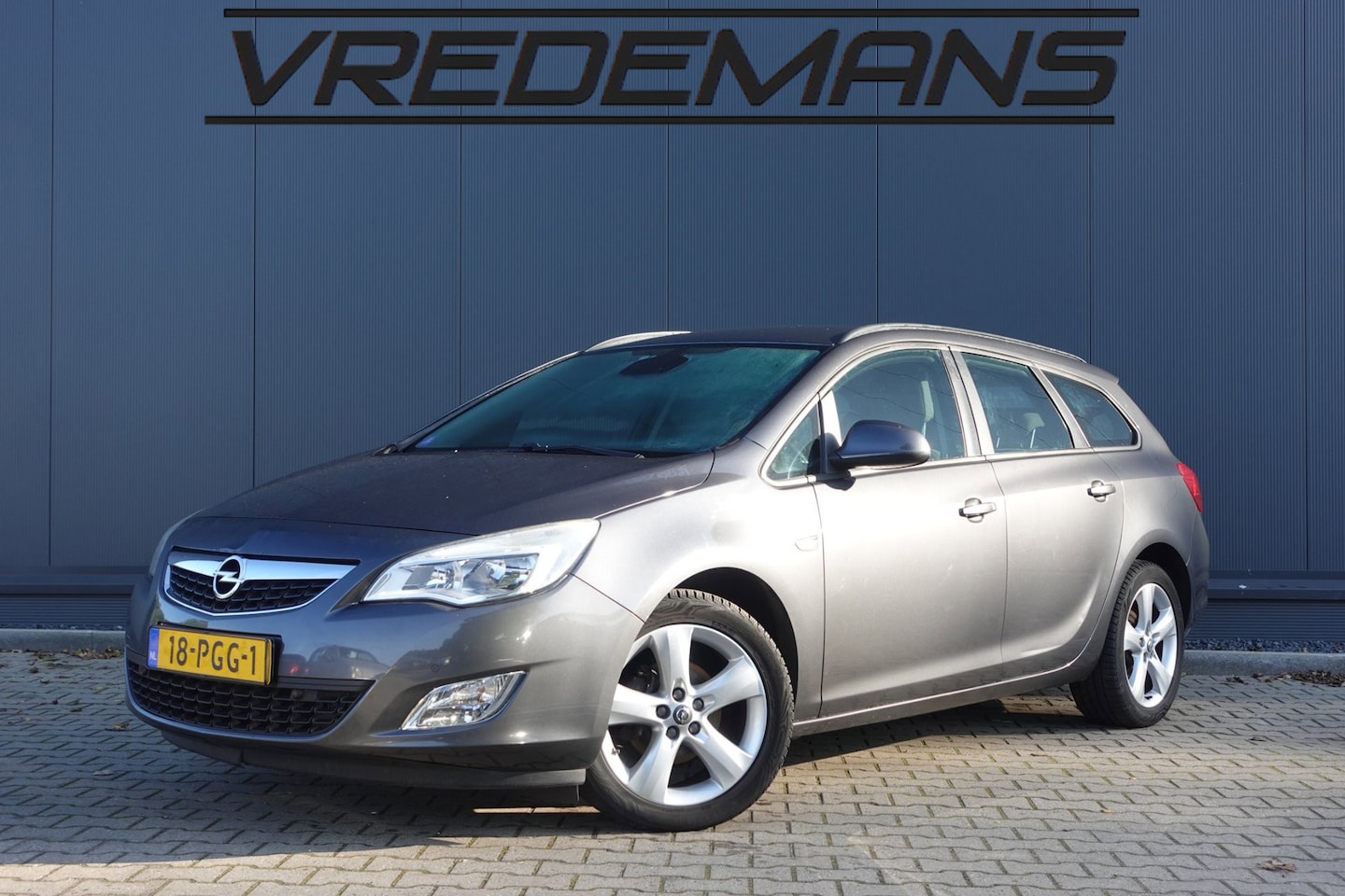 Opel Astra Sports Tourer - 1.4 Turbo Edition 1.4 Turbo Edition - AutoWereld.nl