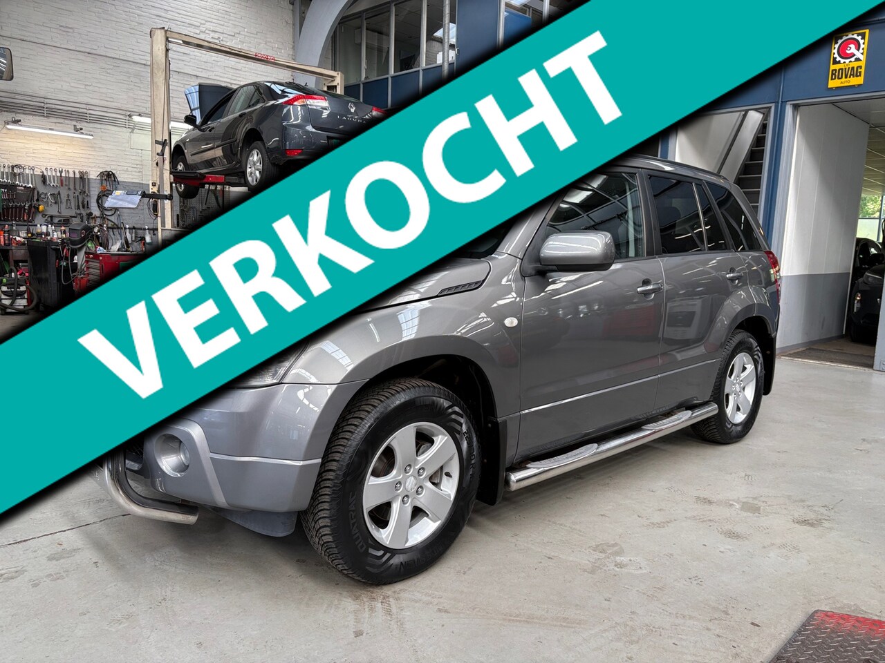Suzuki Grand Vitara - 2.0-16V Shogun | Trekhaak | Camera | Climate control | Nieuwe APK | NAP | Rijklaar prijs! - AutoWereld.nl