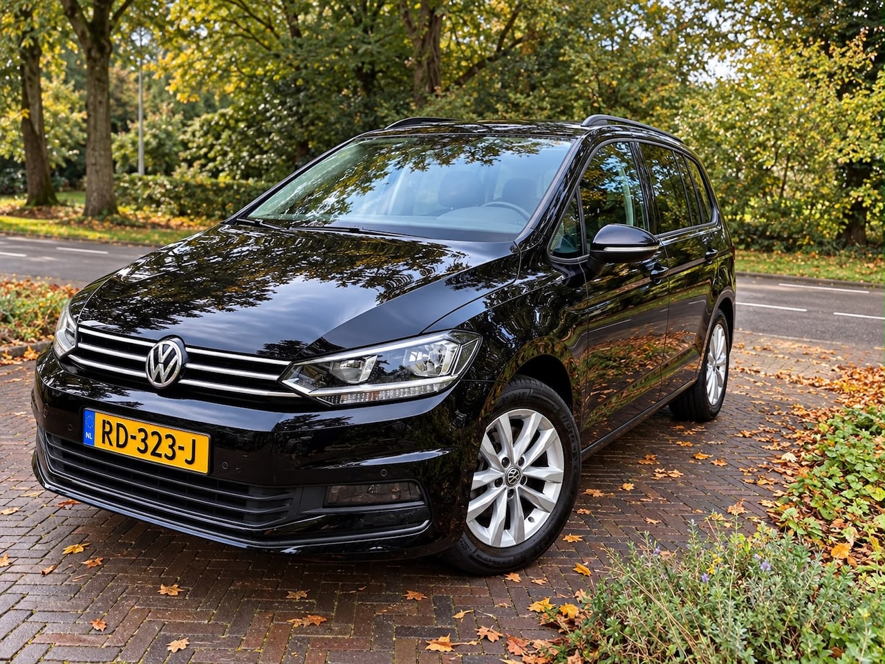 Volkswagen Touran - 1.2 TSI Comfortline 7p - AutoWereld.nl