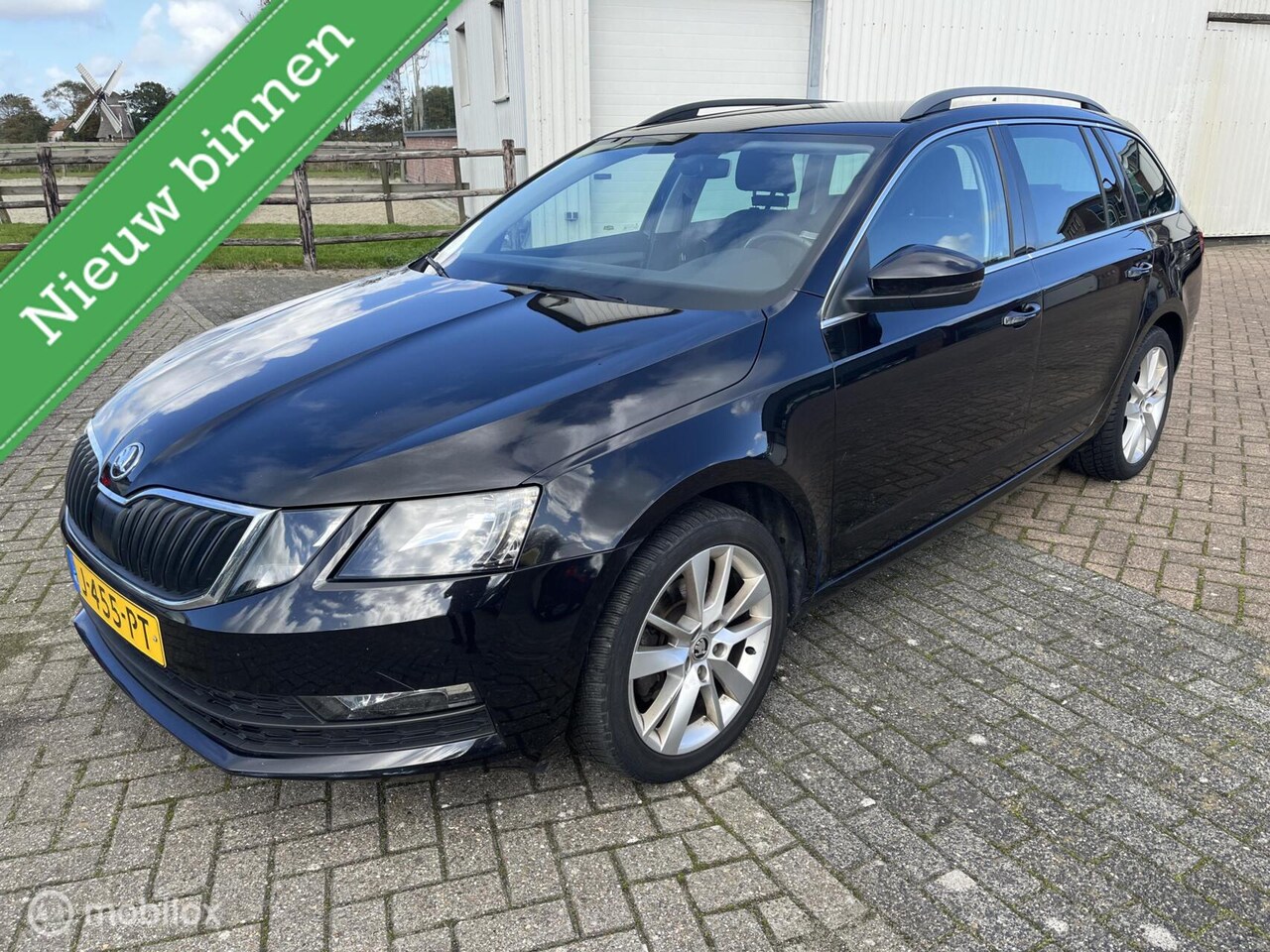 Skoda Octavia Combi - 1.5 TSI AUT Business Edition TREKHAAK - AutoWereld.nl