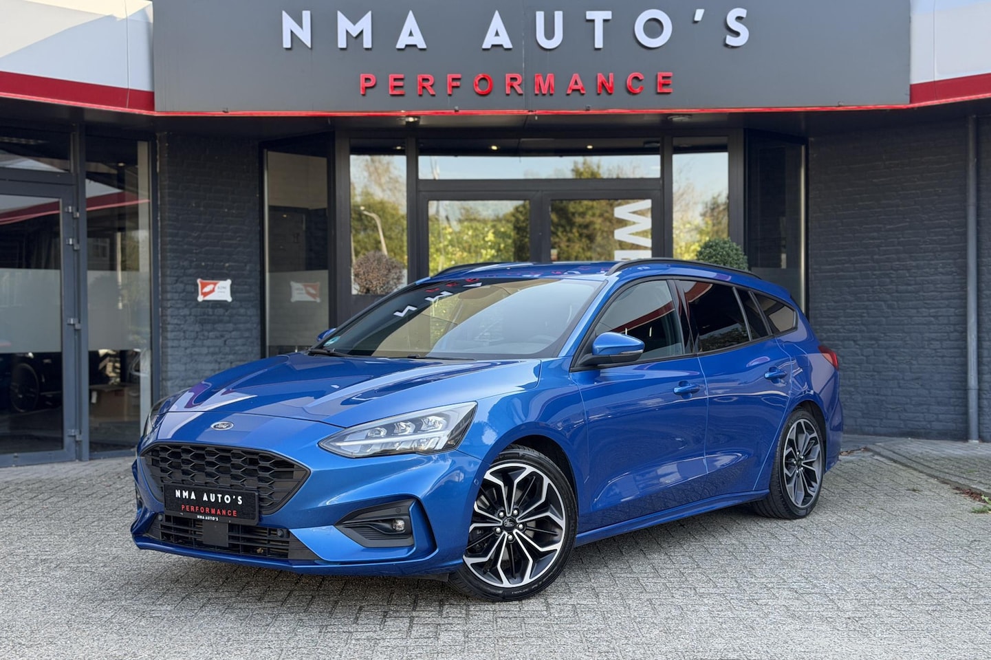 Ford Focus Wagon - 1.5 EcoBoost ST-LINE 1E EIGENAAR, CRUISE, KEYLESS GO, DEALER ONDERHOUDEN, Desert Island Bl - AutoWereld.nl