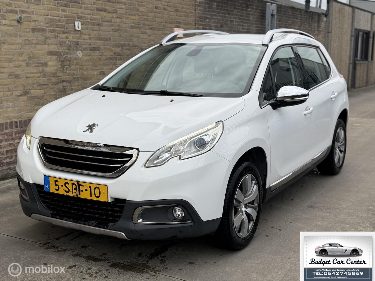 Peugeot 2008 - 1.2 VTi Allure. Hoge instap - AutoWereld.nl